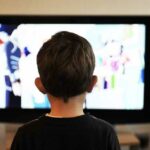 Tennessee_Remote Learning_Kid in Front of TV
