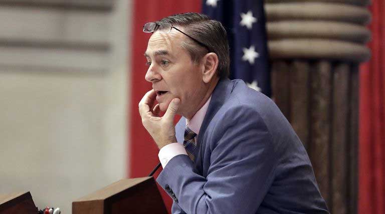 House Speaker Glen Casada, R-Franklin, stands at the microphone during a House session in Nashville, Tennessee