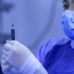 Nurse Prepares COVID-19 Shot