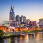 Nashville, Tennessee, USA downtown skyline on the Cumberland River.