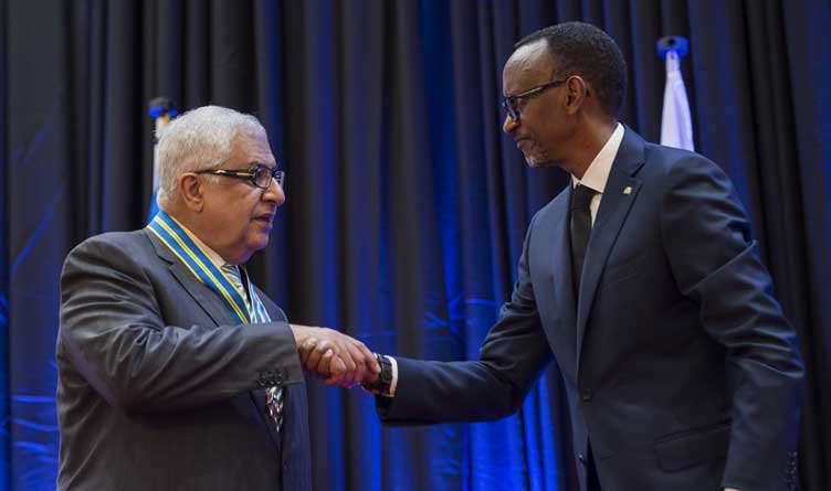 President Kagame congratulating Gilbert R. Chagoury upon bestowing him with the Igihango medal.