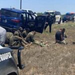 Seven immigrants and an alleged human trafficker apprehended in La Salle County, Texas, April 24, 2021.