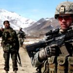 U.S. Army Soldier patrols with Afghan soldiers to check on conditions in the village of Yawez in Wardak province, Afghanistan.